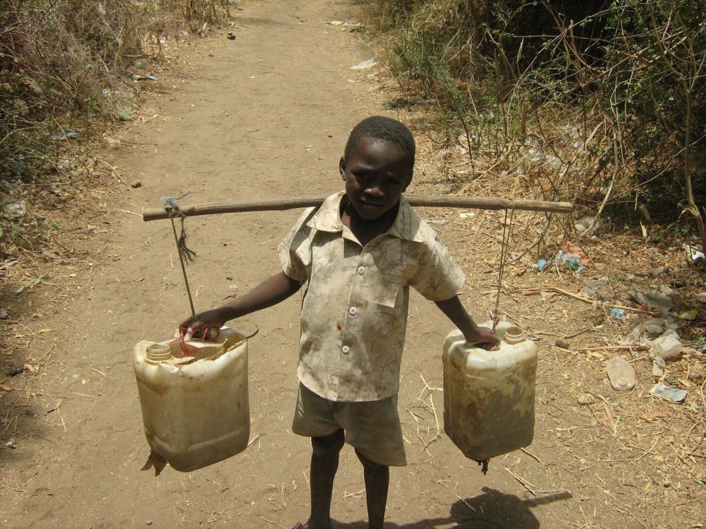 poor kid with water